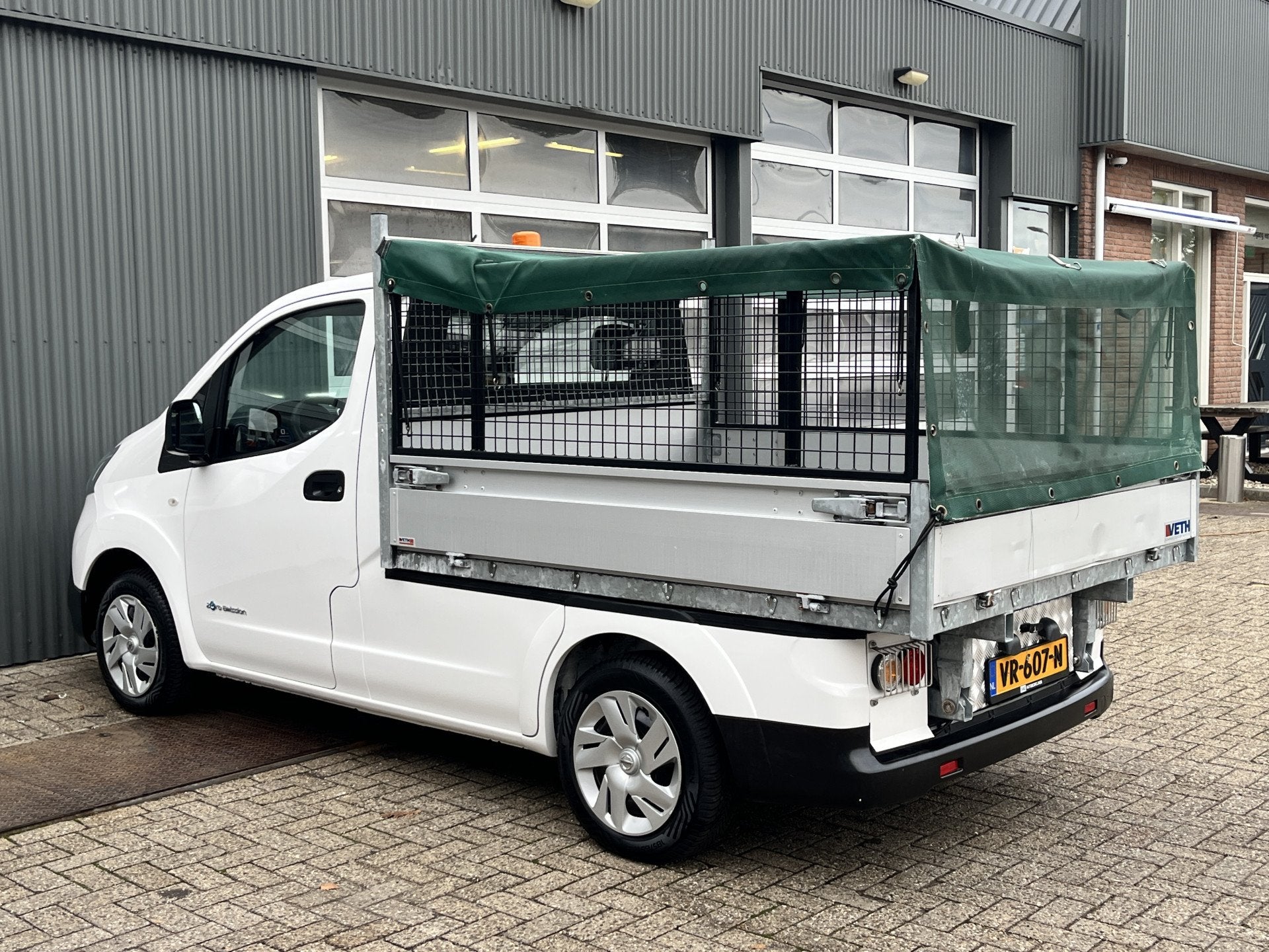 Nissan E-NV200 24kWh 100% electrische Pick-up Openlaadbak Ai, Auto's, Stof, Gebruikt, Zwart, Wit