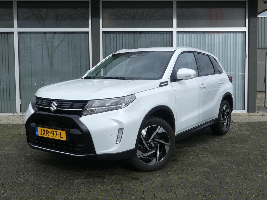 Suzuki Vitara 1.5 Hybrid Style Automaat Panorama dak, Pearl, Auto's, Suzuki, 12 maanden, Gebruikt, 400 kg, 116 pk