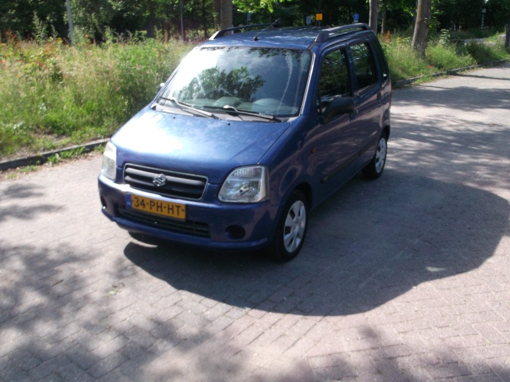 Suzuki Wagon R+ 1.3 2004 Blauw 95500 km, Auto's, Voorwielaandrijving, Stof, 40 €/maand, Metallic lak