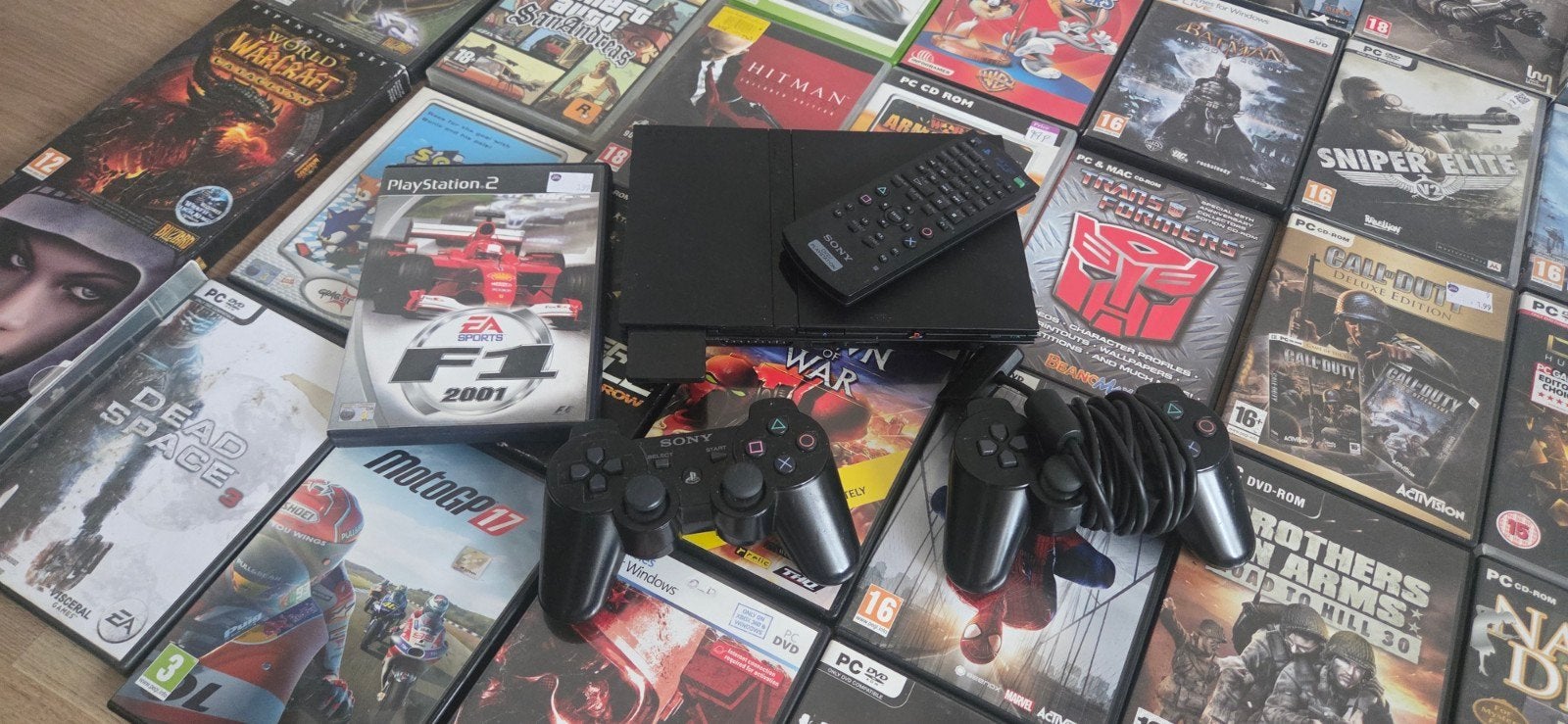 PlayStation 2 Slim + 2 originele controllers + afstandsbedie, Cd's en Dvd's, Alle leeftijden, Ophalen of Verzenden, Gebruikt