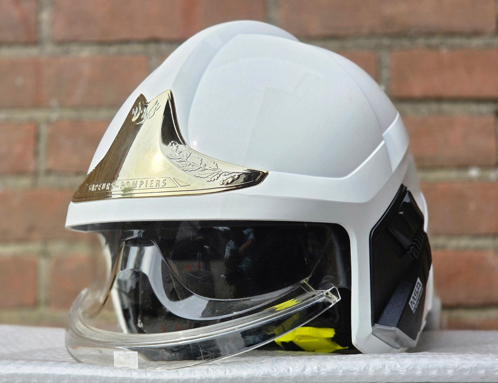brandweerhelm brandweer MSA F1xF M Frankrijk officier VAR, Ophalen of Verzenden, Landmacht, Nederland, Embleem of Badge