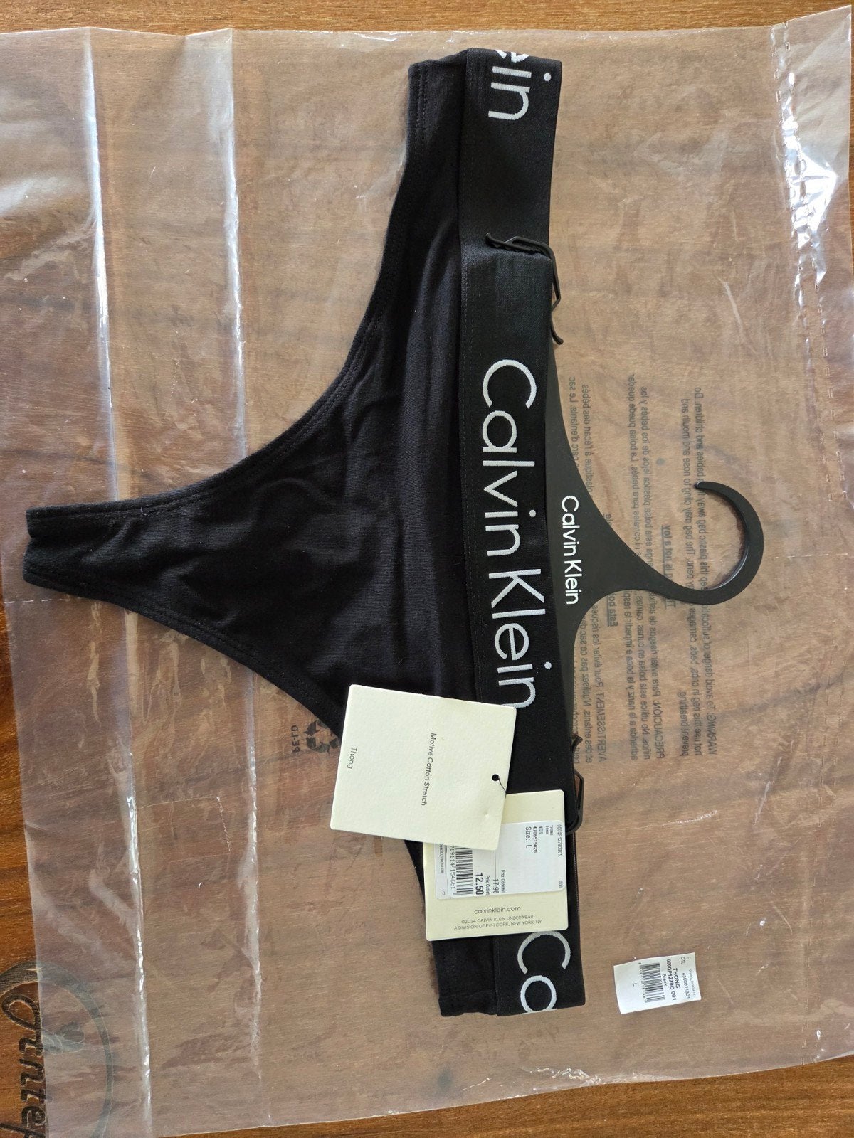 Calvin Klein Zwarte String - Maat L, Kleding | Dames, Calvin Klein, Ophalen of Verzenden, Zwart, String