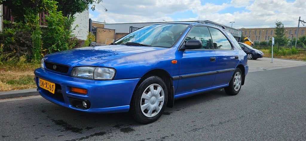 Subaru Impreza Plus 1.6 GL, Auto's, Subaru, Gebruikt, 4 cilinders, Blauw, 1055 kg