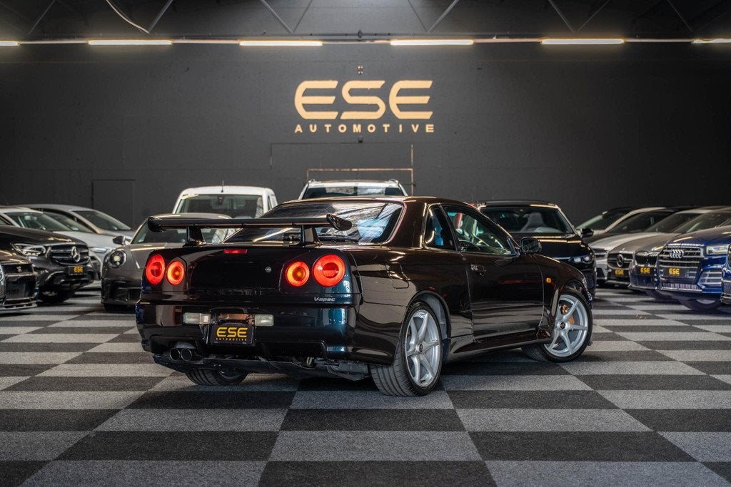 Nissan Skyline R34 GTR V-spec Midnight Purple II, Auto's, Stof, Gebruikt, Zwart, Overige kleuren