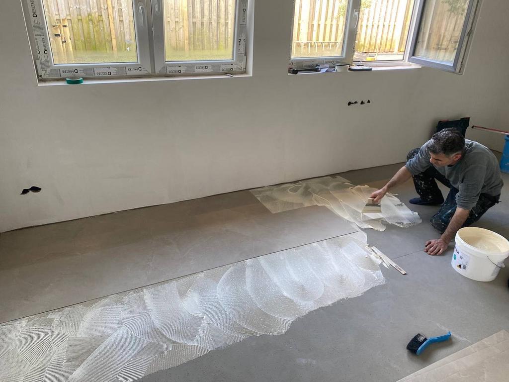 Foto 12 van Spuitwerk tegelzetter badkamer renovatie vloerleger bouwwerk