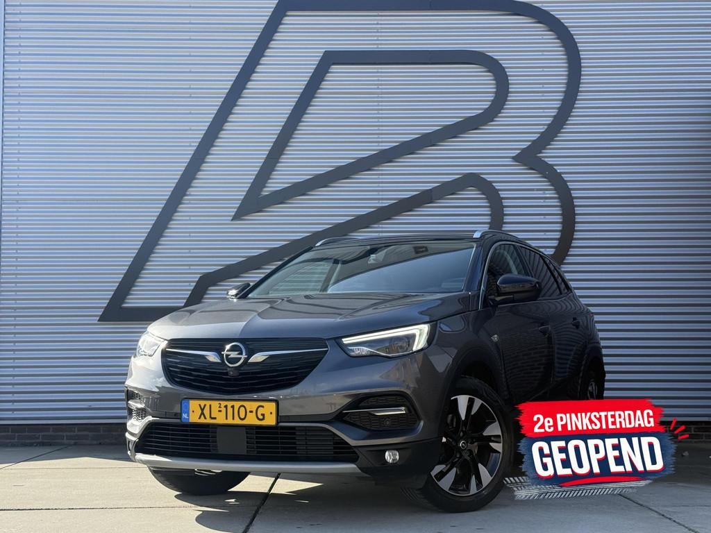 Opel Grandland X 1.2 Turbo Ultimate Navi|Camera|Carplay|Clim, Gebruikt, Euro 6, 1199 cc, Leder en Stof