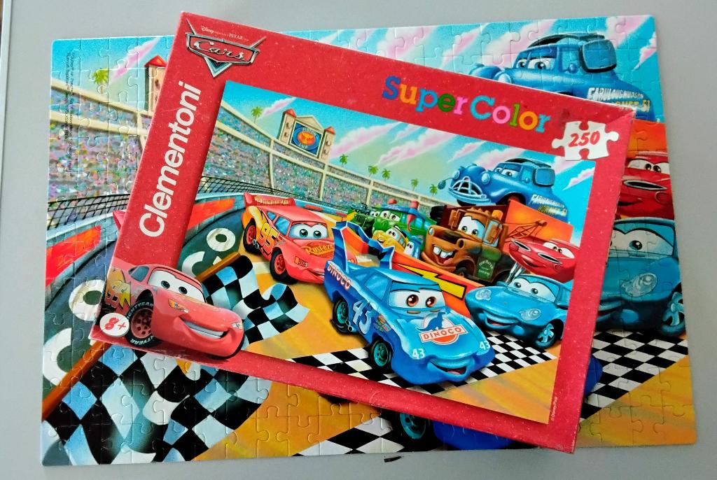 Legpuzzel - puzzel Cars - Disney Pixar - Supercolor Clemento, Ophalen of Verzenden, Meer dan 50 stukjes, Gebruikt, 6 jaar of ouder