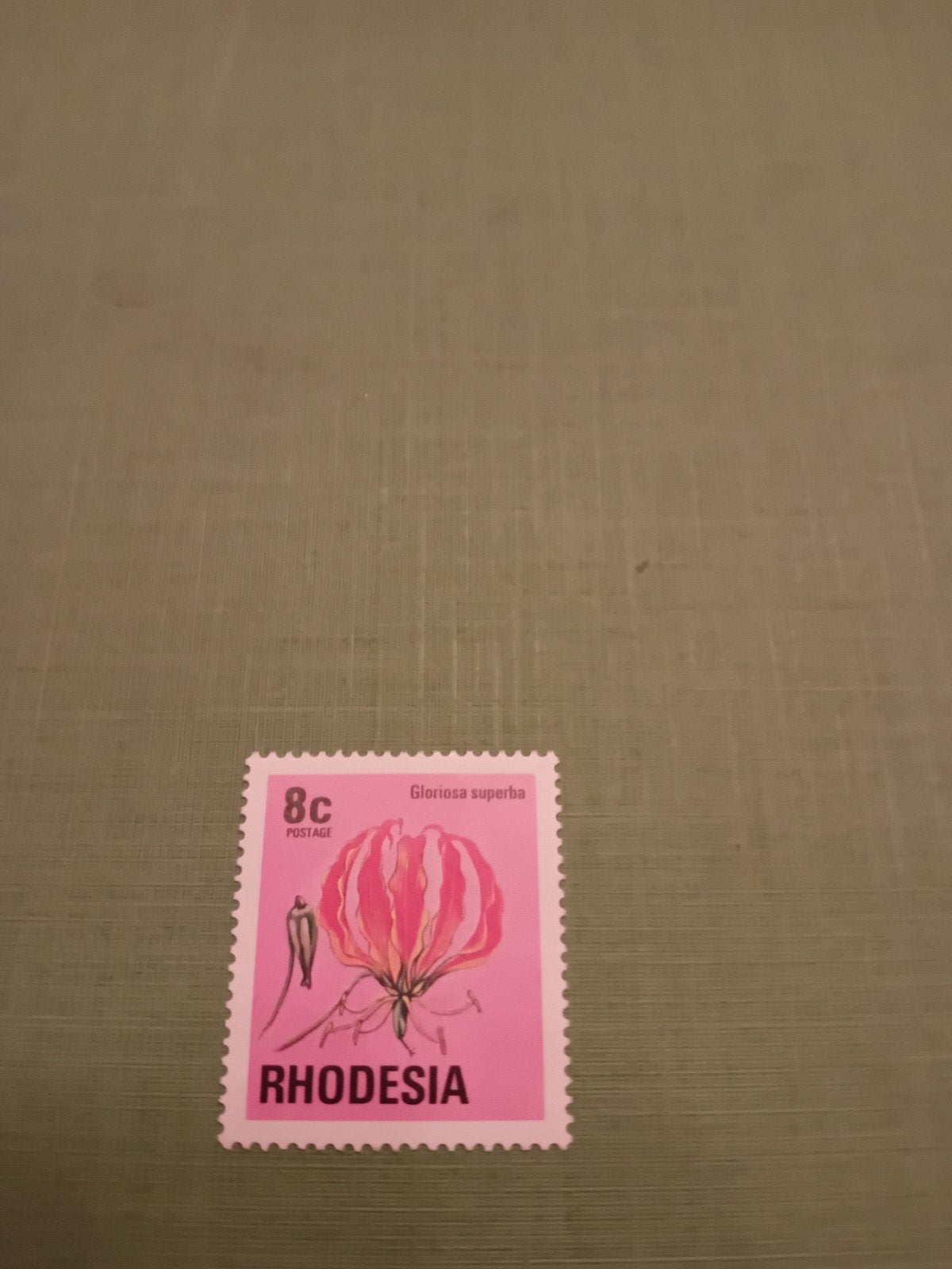 Rhodesia 8c Gloriosa superba postzegel, Ophalen of Verzenden, Postfris
