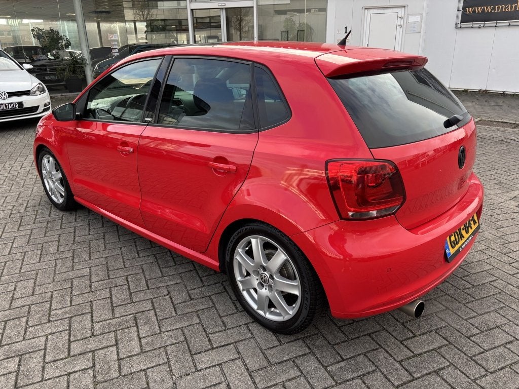 Volkswagen Polo 1.2 Comfortline Panorama Cruise Parkeersenso, Voorwielaandrijving, Euro 5, Gebruikt, Zwart