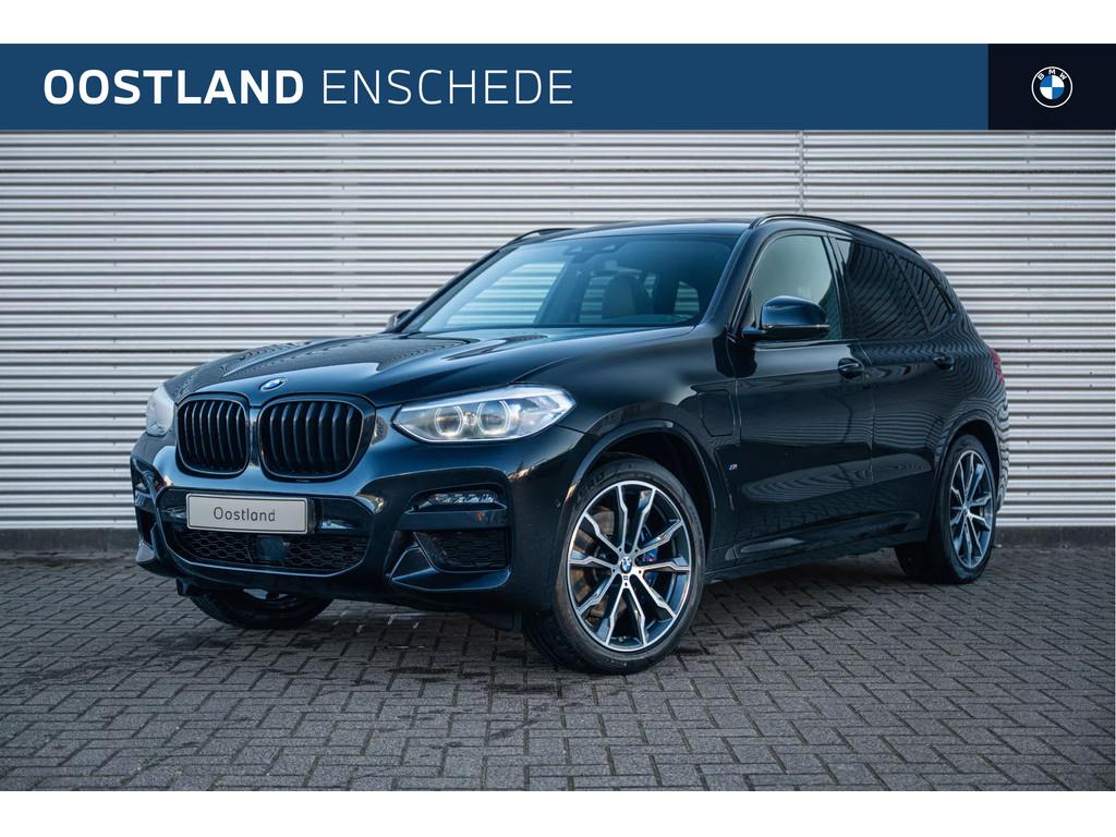 BMW X3 xDrive30e High Executive M Sport Automaat / Panoramad, Auto's, BMW, Gebruikt, 4 cilinders, Leder en Stof, Zwart