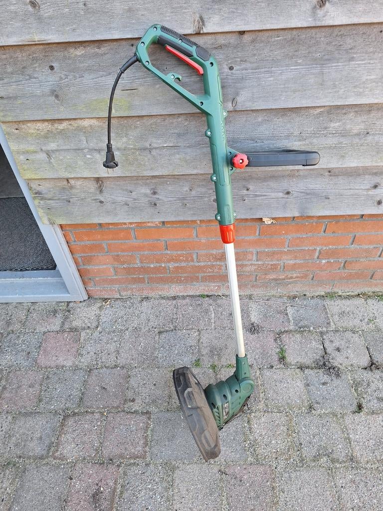 Grastrimmer (Kantjesmaaier ), Ophalen, Elektrisch
