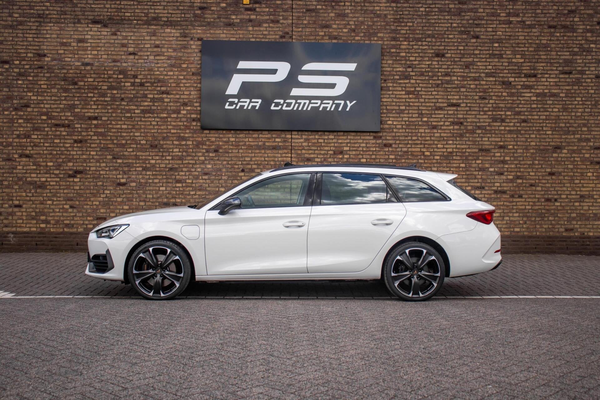 CUPRA Leon Sportstourer 1.4 e-Hybrid 245PK, Pano, Half Leder, Auto's, Gebruikt, 4 cilinders, Met garantie (alle), Leon