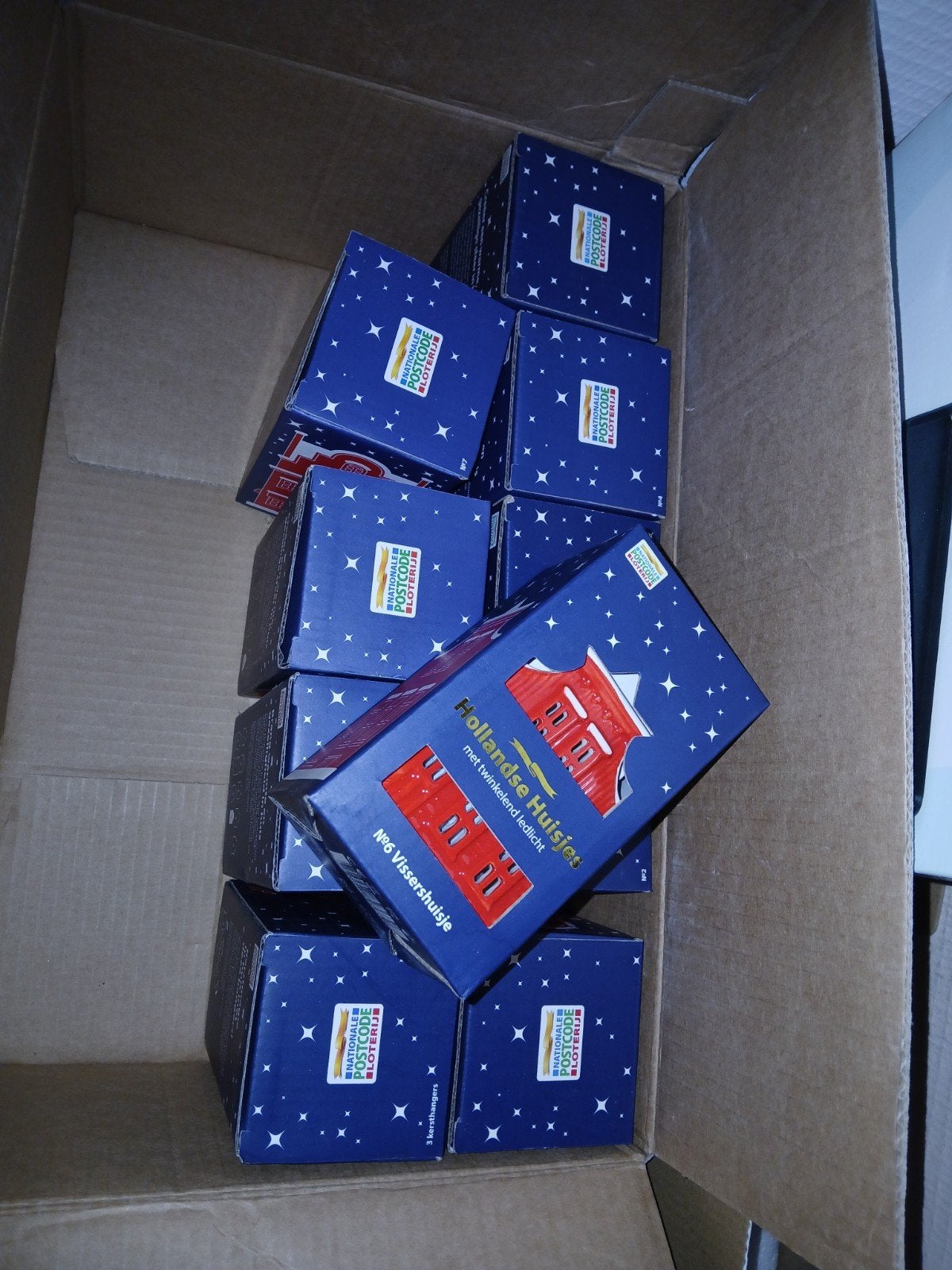 ah kersthuisjes van postcodeloterij, Ophalen