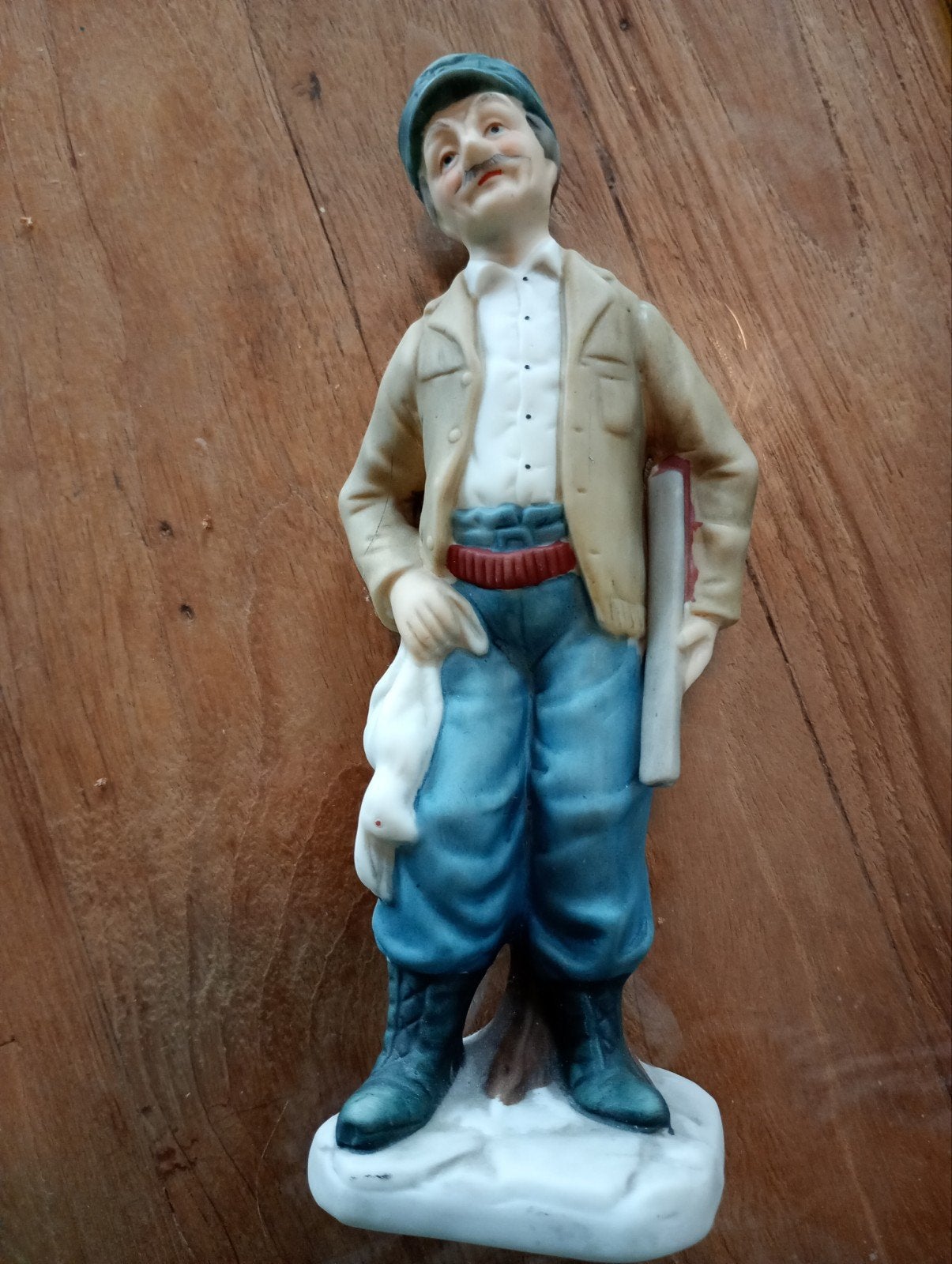 Vintage porseleinen beeldje van jager met prooi en bijl, Ophalen of Verzenden, Gebruikt, Mens