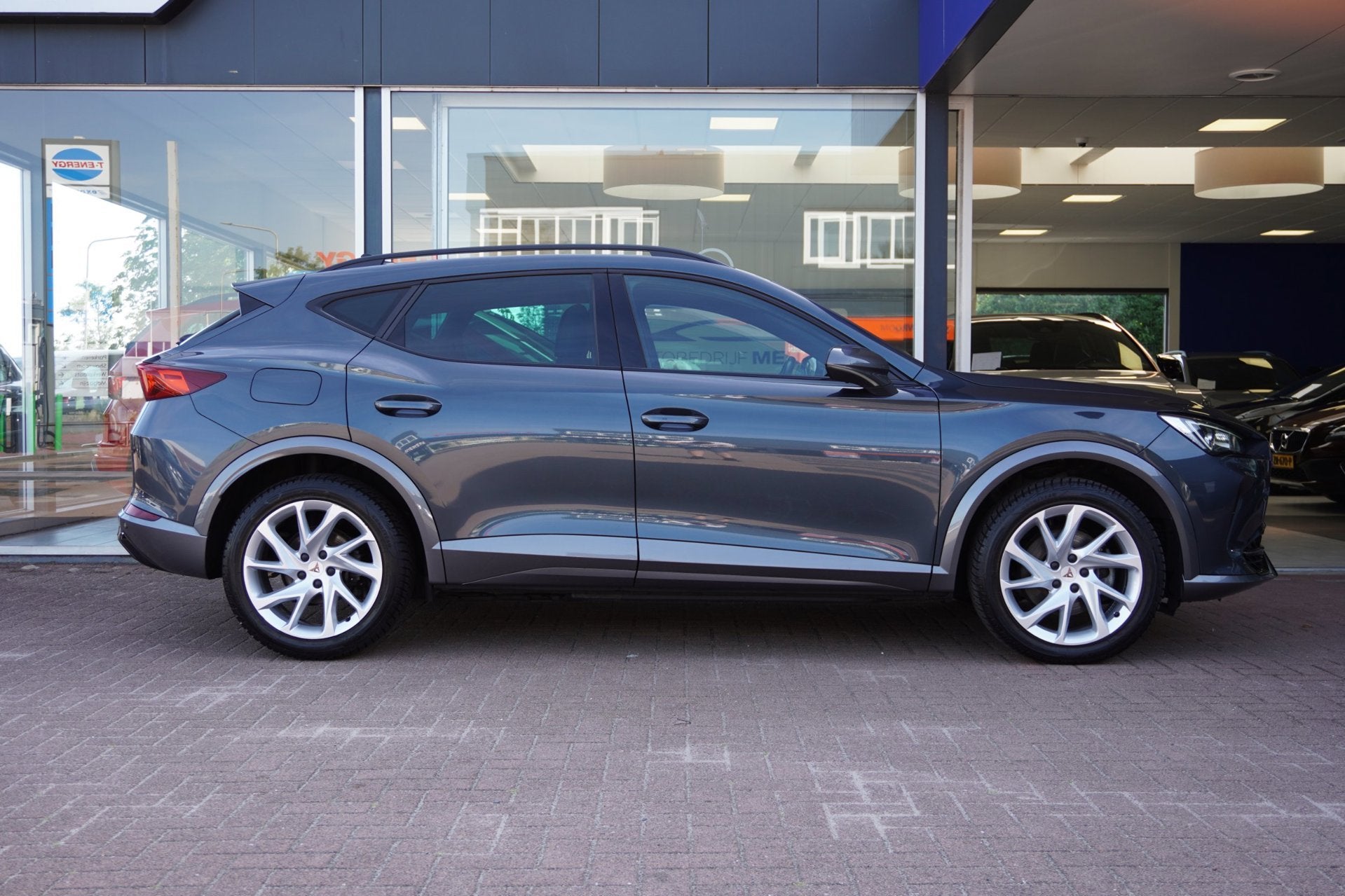Cupra Formentor 1.4 e-Hybrid Business Automaat | Airco | Nav, Auto's, Dealer onderhouden, Gebruikt, 4 cilinders, Leder en Stof