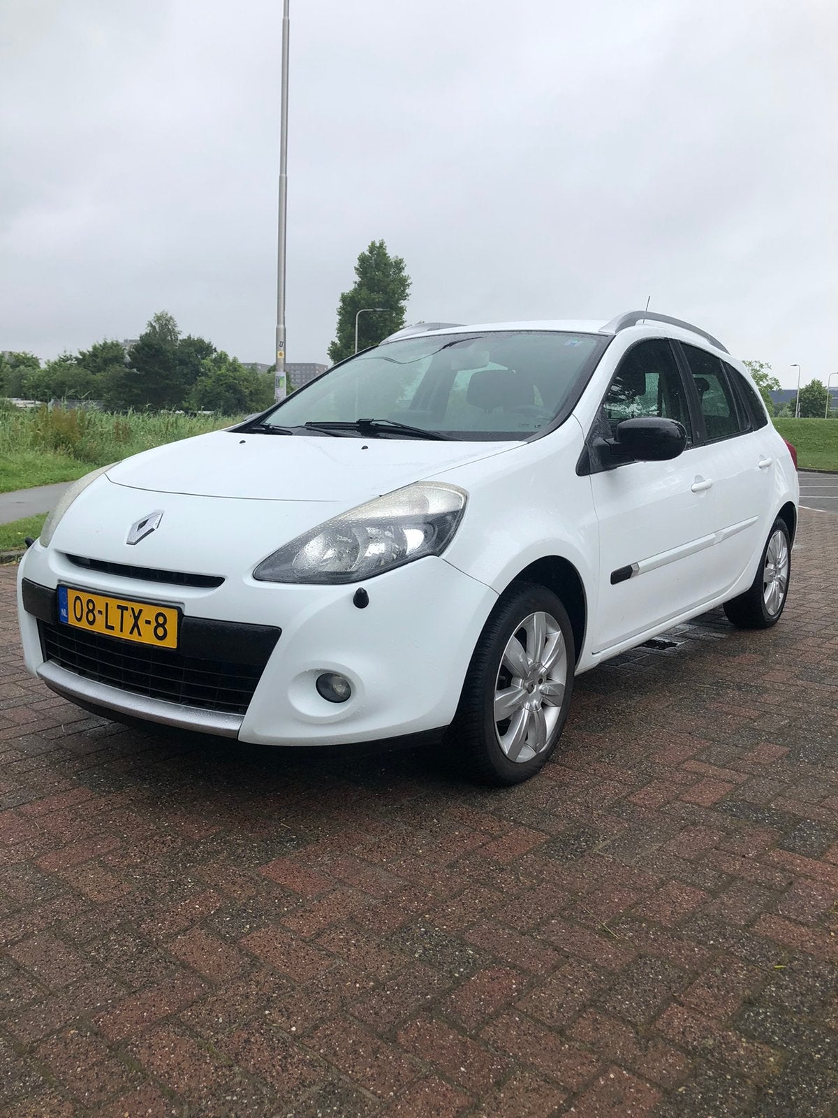 Renault Clio 1.2 TCE Estate 2010 Wit. Navi-Cruise-Nap-APK, Auto's, Renault, Voorwielaandrijving, Zwart, 4 cilinders, 1095 kg