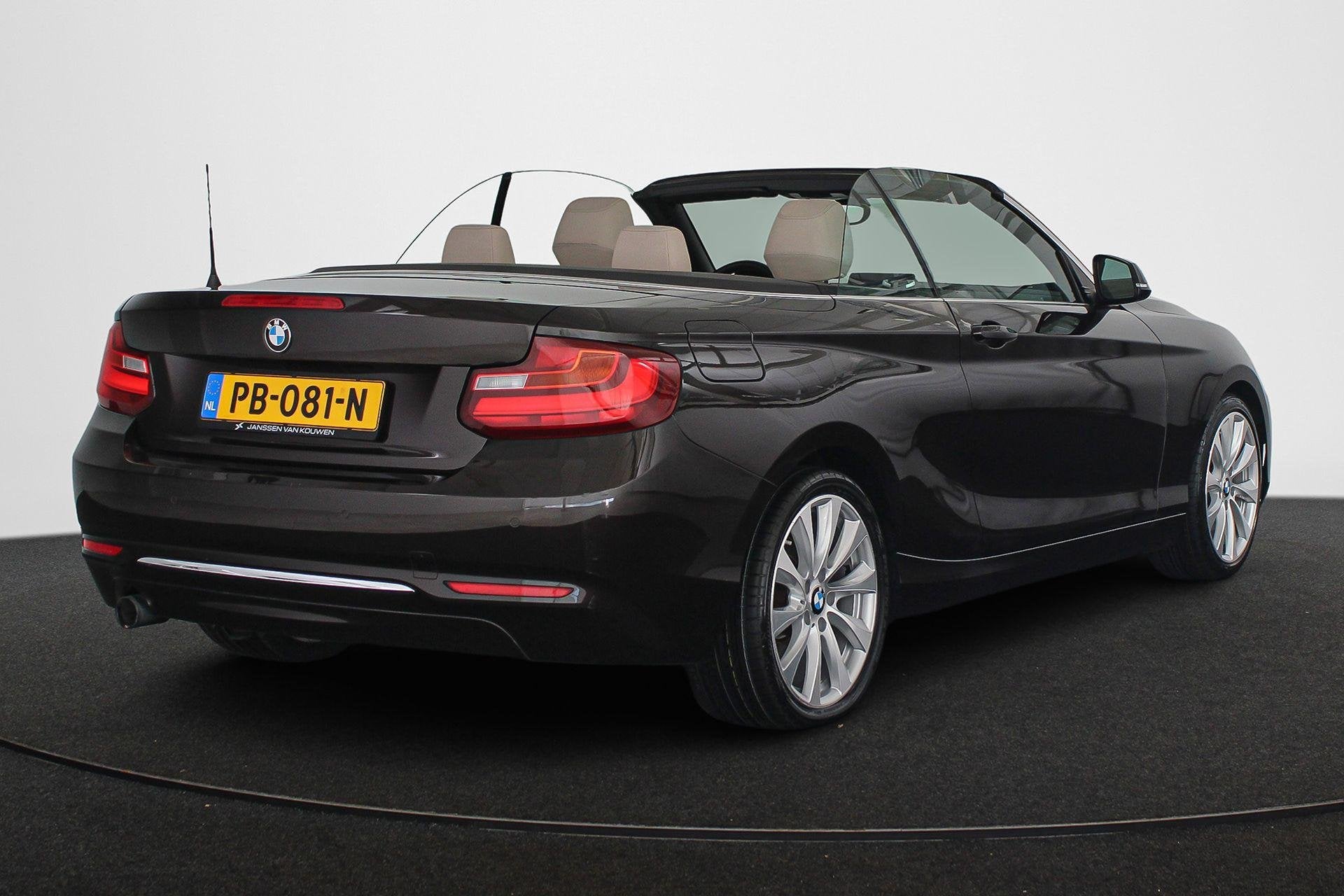 BMW 2-serie Cabrio 218i High Executive Luxury Line Stoelverw, Auto's, Automaat, Gebruikt, Euro 6, 4 stoelen