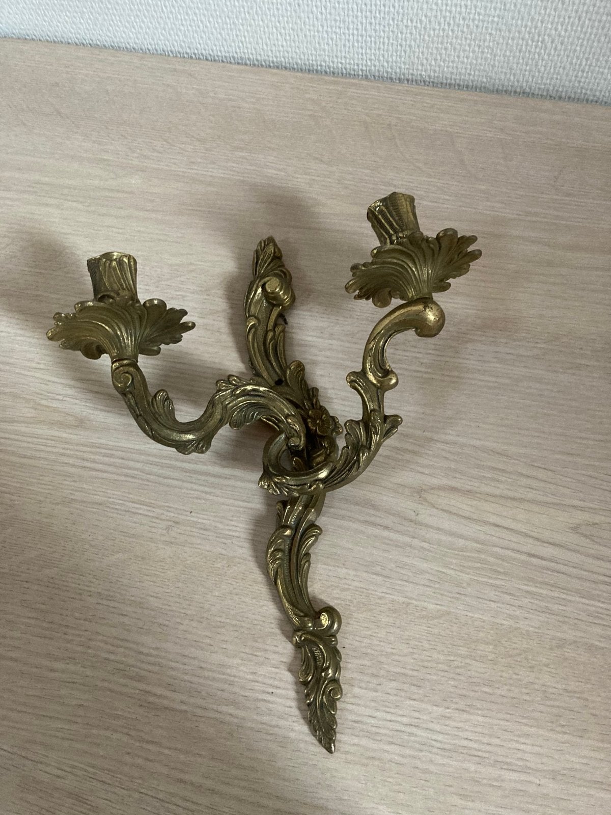 Koperen wandkandelaar, Ophalen