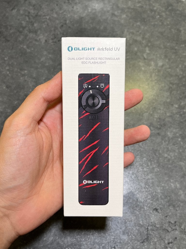Olight Arkfeld UV Black Lava Limited Edition Flashlight, Ophalen of Verzenden, Nieuw, Batterij