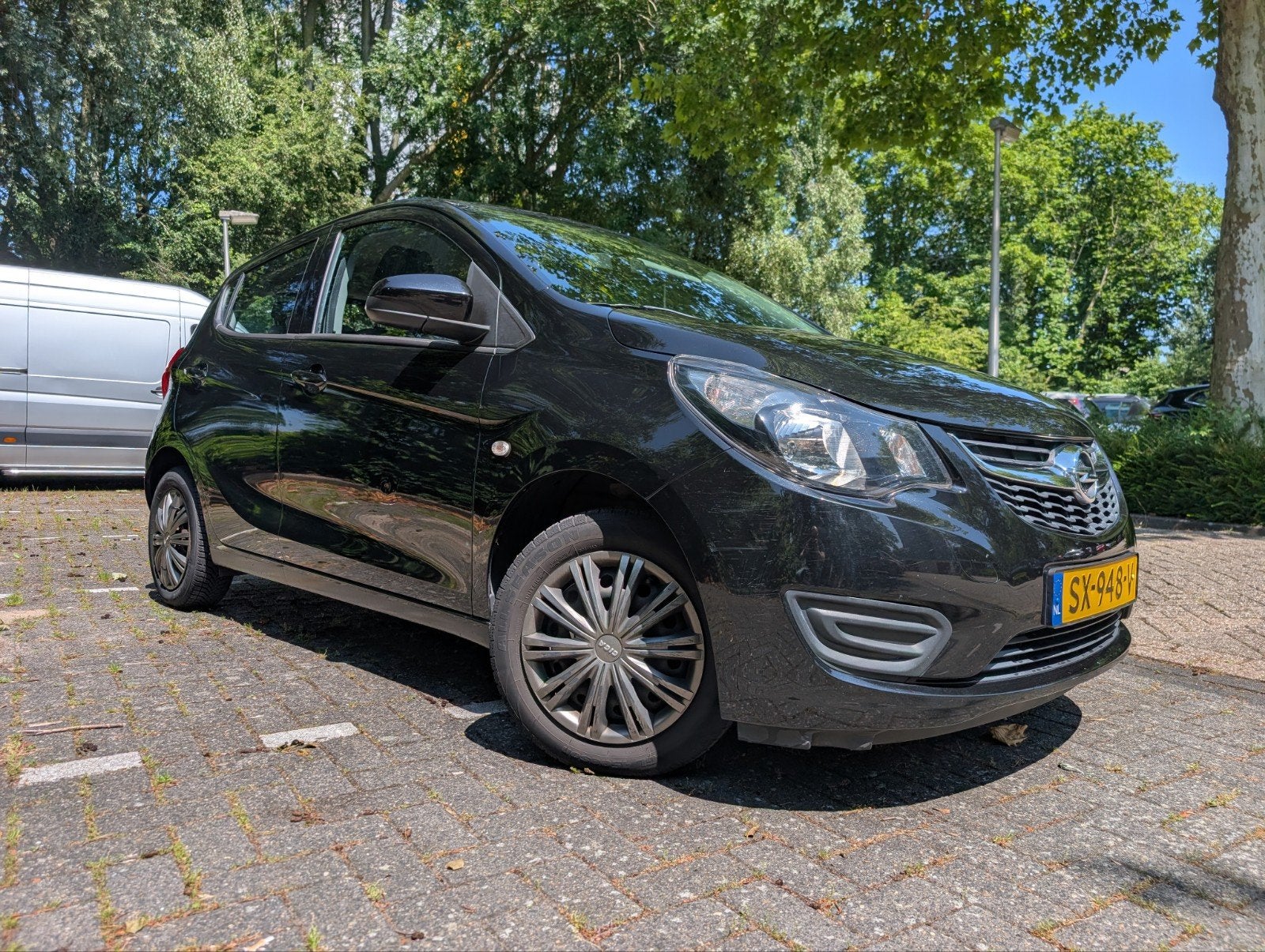 Opel Karl 1.0 Ecoflex 55KW 2018 Zwart, Auto's, Voorwielaandrijving, 839 kg, 74 pk, Zwart