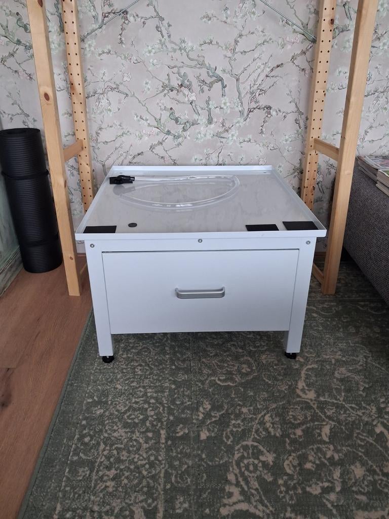 Wasmachine verhoger, Ophalen