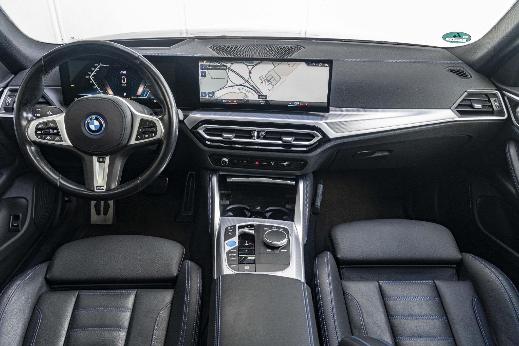 BMW i4 eDrive40 | High Executive | M Sport | Schuif-/kanteld, Auto's, 590 km, Met garantie (alle), Blauw, Origineel Nederlands