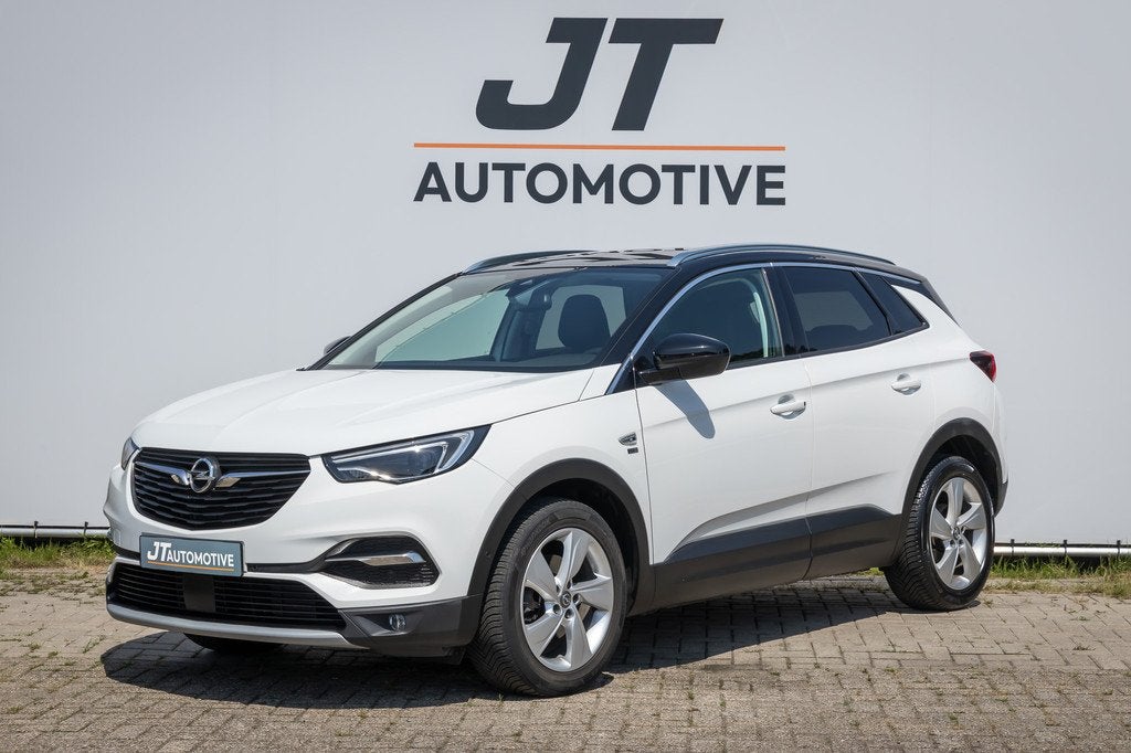 Opel Grandland X 1.2 Turbo 120 jaar edition Trekhaak | Stoel, Auto's, Opel, Gebruikt, Euro 6, 1199 cc, Automatische klimaatregeling