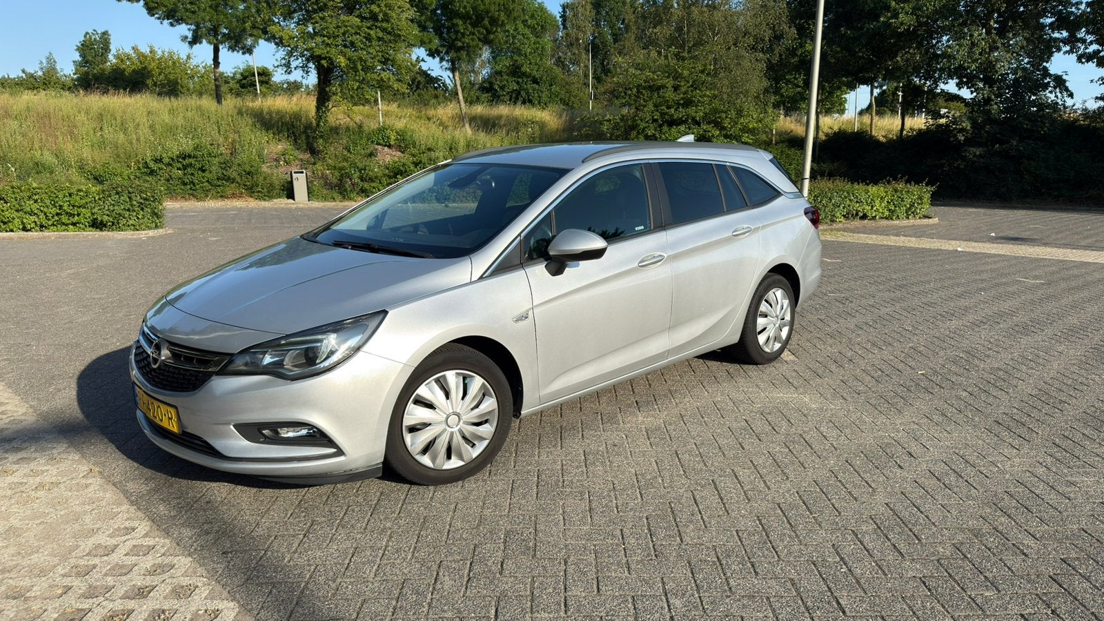Opel Astra 1.4 Turbo 110KW Sports Tourer AT 2017 Grijs, Ophalen