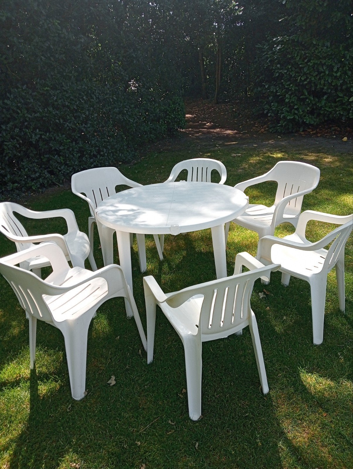 tuinstoelen en tafel., Ophalen, Gebruikt, Kunststof, Stapelbaar