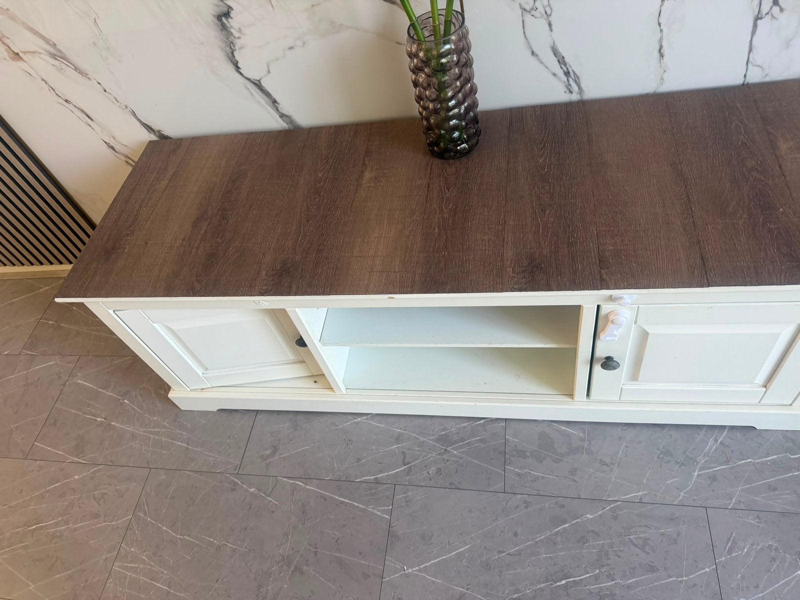Tv kast te koop, Ophalen