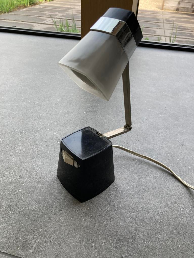 Taki light Iris lamp, Ophalen