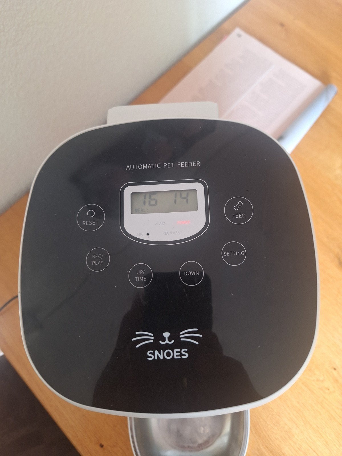 Voerautomaat snoes voor katten, Ophalen