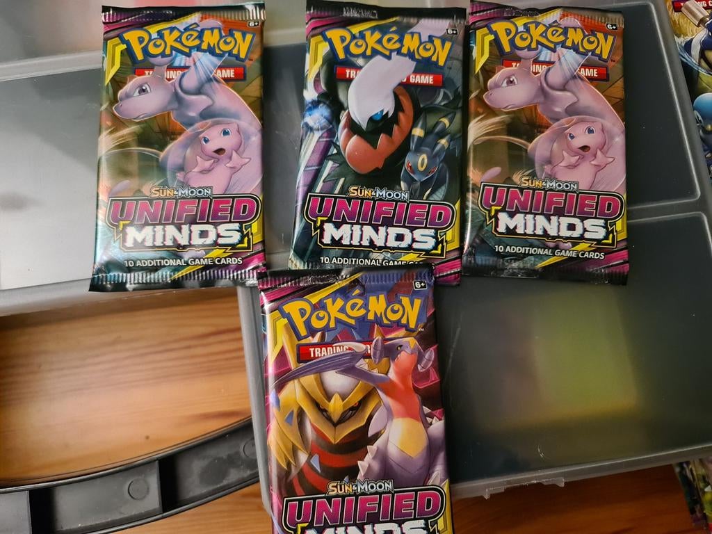 Unified minds pokemon boosters, Ophalen of Verzenden, Zo goed als nieuw, Booster