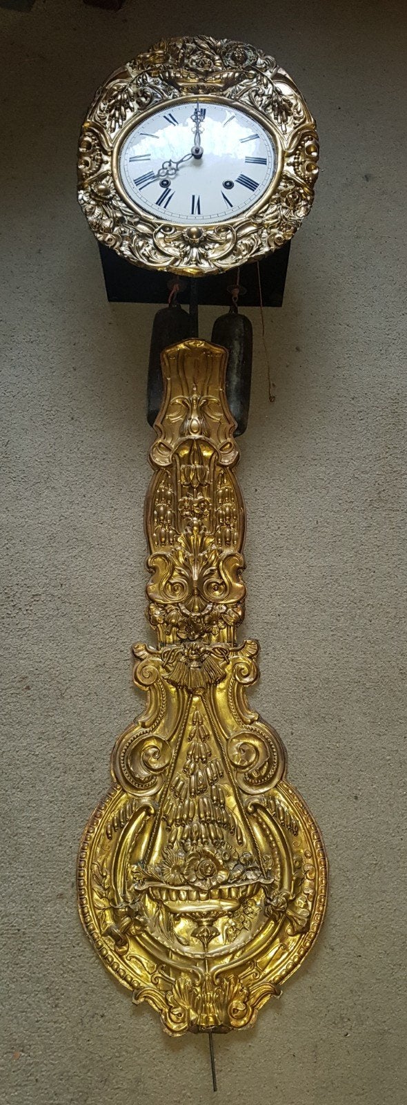 Antieke comtoise klok., Ophalen