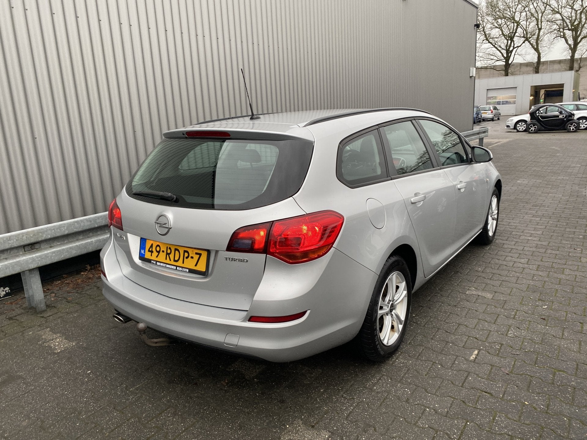 Opel Astra Sports Tourer 1.4 Turbo Cosmo Clima, Half Leder,, Auto's, Voorwielaandrijving, Euro 5, Gebruikt, 4 cilinders
