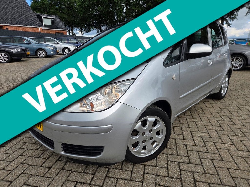 Mitsubishi Colt 1.3 Invite 5Drs 2005 Automaat/Airco/Elektris, Auto's, Mitsubishi, Voorwielaandrijving, Stof, Gebruikt, 31 €/maand