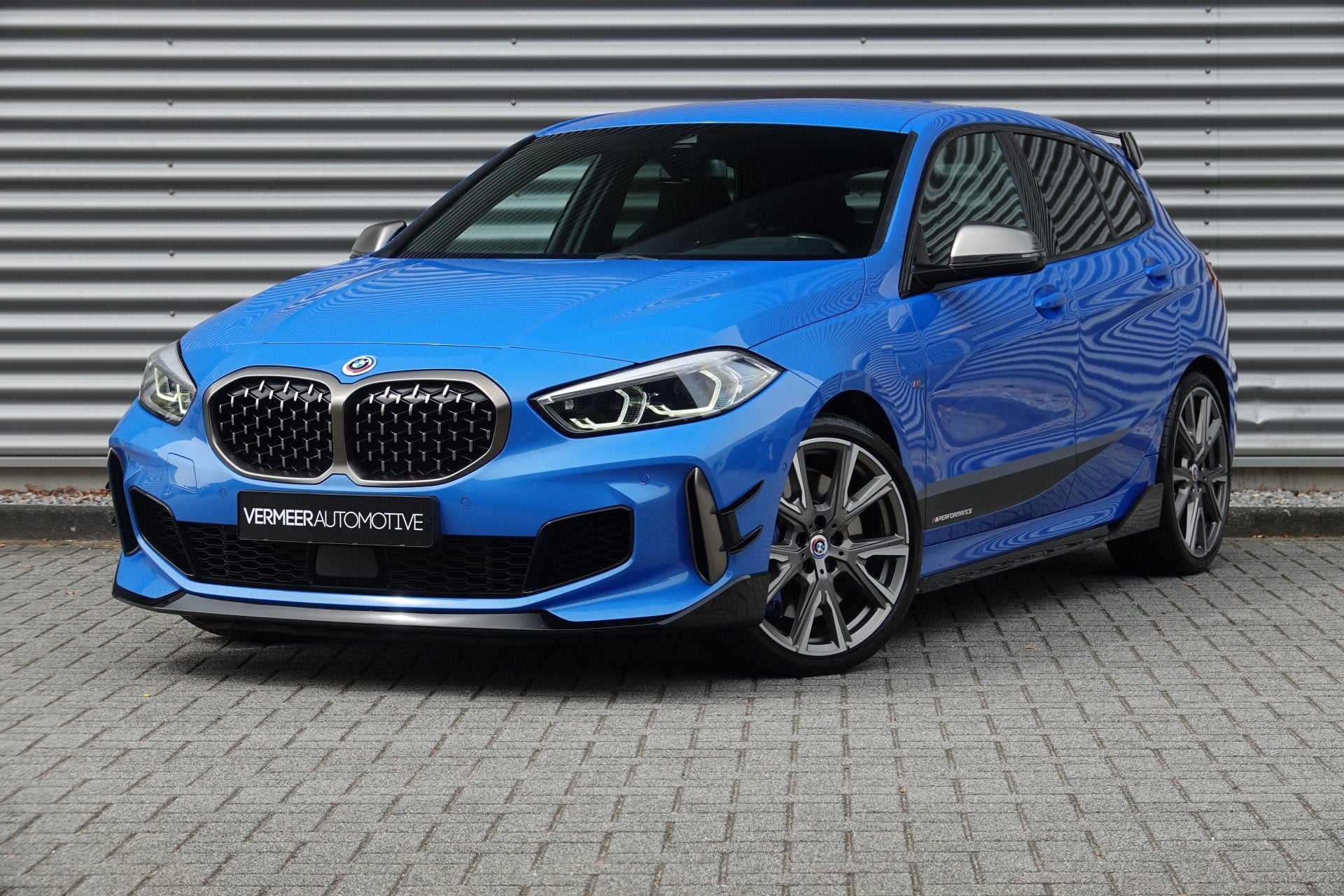 BMW 1-serie M135i xDrive High Executive | M Performance | HU, Auto's, Gebruikt, 4 cilinders, Blauw, Alcantara
