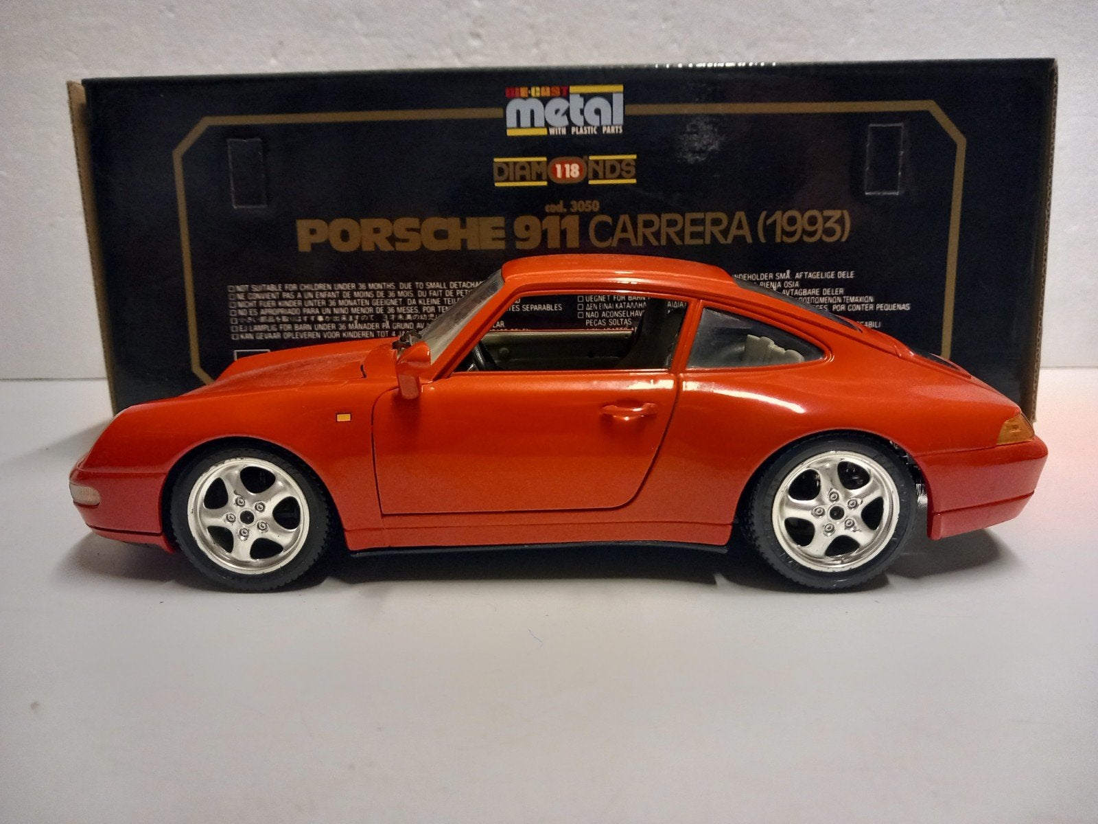 Porsche 911 Carrera Coupe rood 1993 Bburago metal 1:18 KRD, Ophalen of Verzenden, Zo goed als nieuw, Auto's