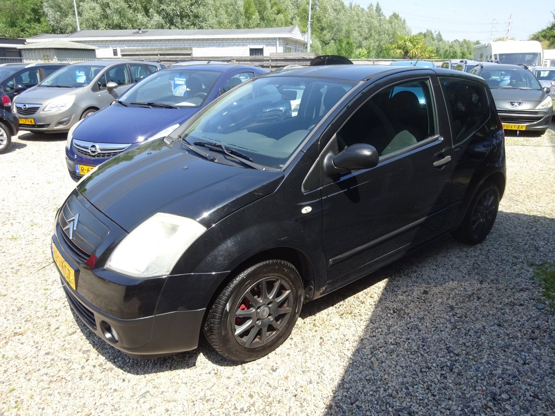 Citroen C2 1.1i Séduction stuurbekr sport velgen, Voorwielaandrijving, Gebruikt, 4 cilinders, Zwart
