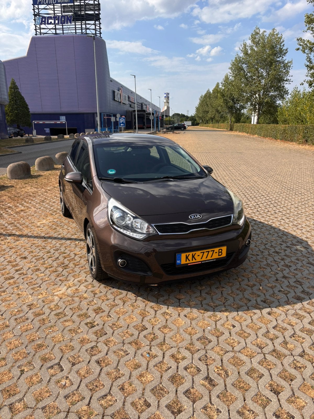 Kia Rio 1.2 CVVT | 2012 | Nieuwe versnel | Airco | Bluetooth, Voorwielaandrijving, 40 €/maand, Zwart, 4 cilinders