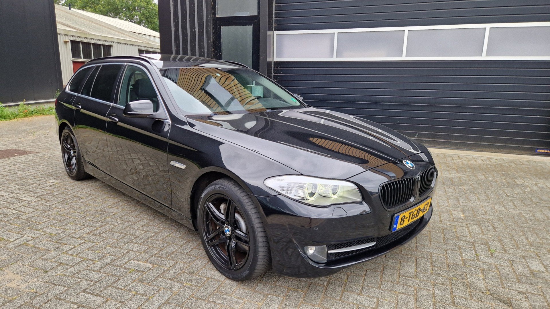 BMW 5-serie Touring 528xi High Executive Pano/Leder/Navi, Auto's, Automaat, Gebruikt, Zwart, 4 cilinders