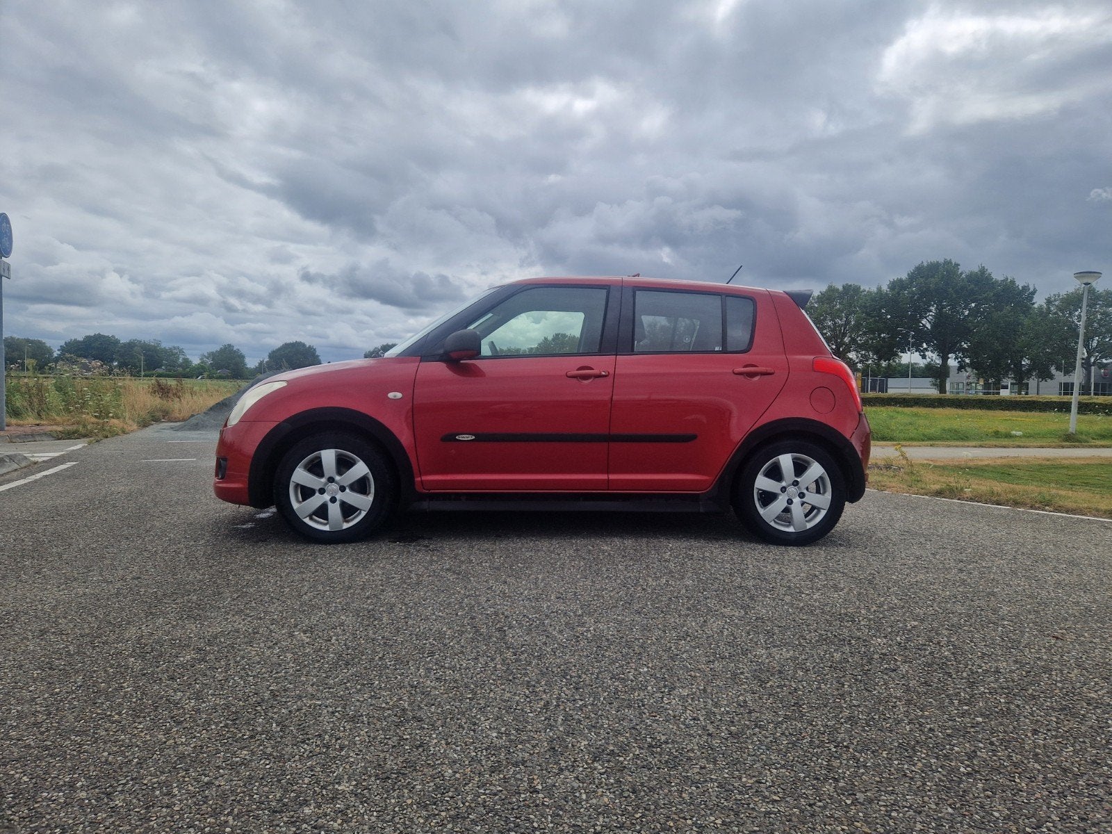 Suzuki Swift 1.3 5DRS 2008 Rood, Auto's, Voorwielaandrijving, Stof, 40 €/maand, Zwart