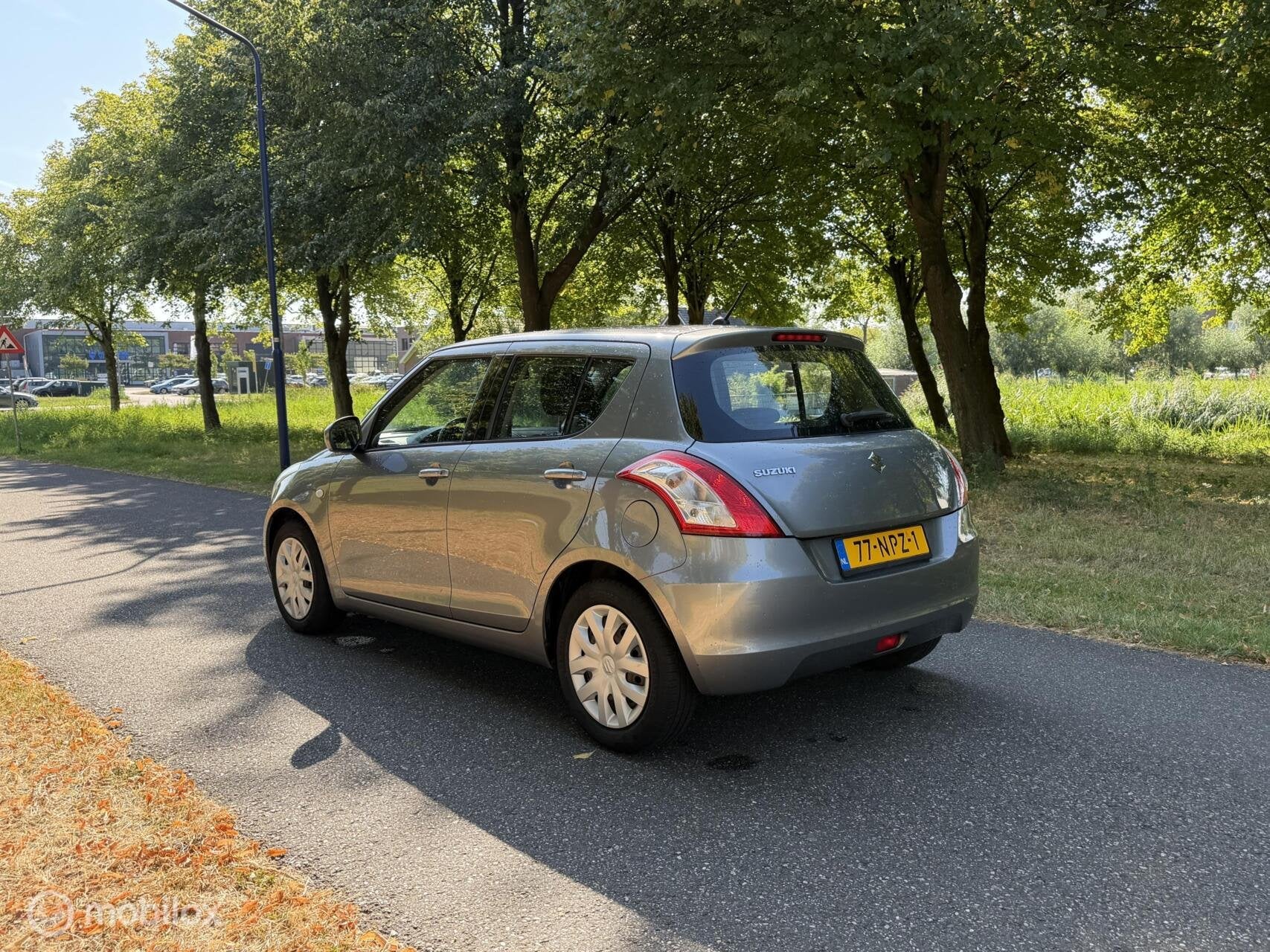 Suzuki Swift 1.2 Comfort*NEW APK 08/27*AIRCO*STOELVERWARMING, Auto's, Voorwielaandrijving, Stof, 4 cilinders, 400 kg