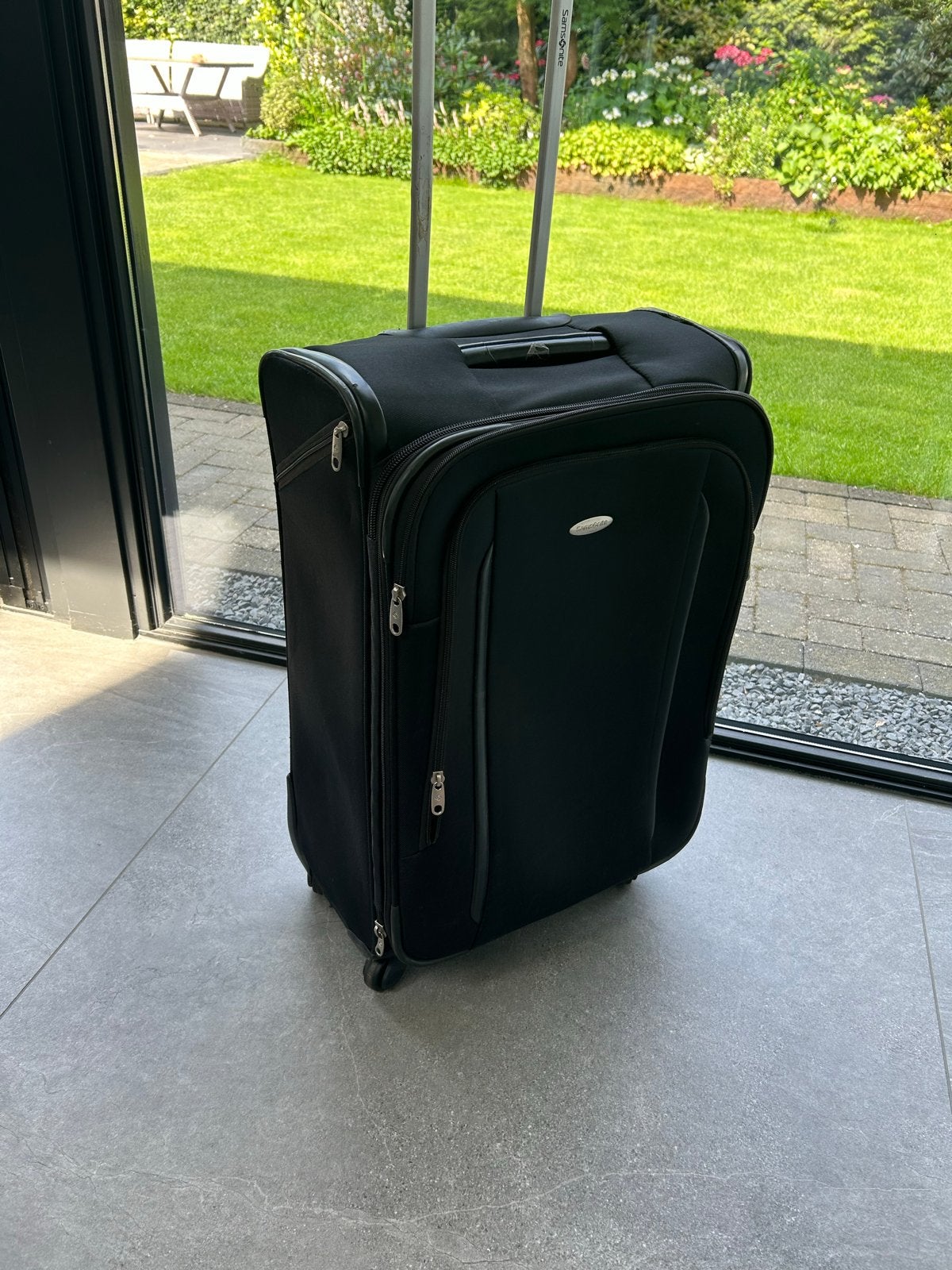 Samsonite Rolkoffer - Uitschuifbaar Handvat - Zwart, Sieraden, Tassen en Uiterlijk, Koffers, Gebruikt, Zacht kunststof, 60 tot 70 cm