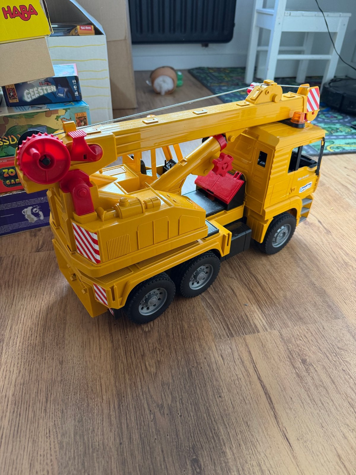 Gele speelgoedkraanwagen, Ophalen, Gebruikt