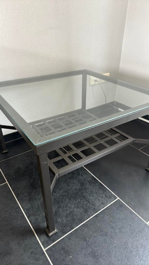 Glazen salontafel met ijzeren onderstel, Huis en Inrichting, Tafels | Salontafels, Ophalen, Gebruikt, 100 tot 150 cm, 50 tot 100 cm