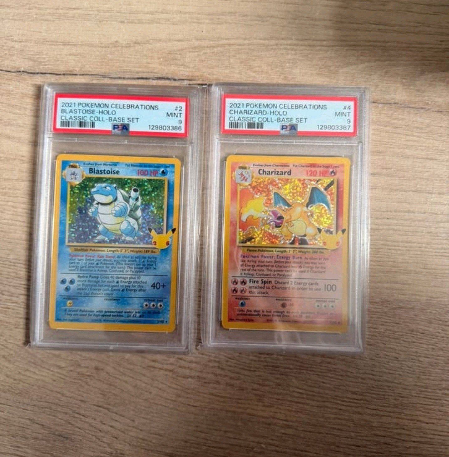 Pokémon Celebrations Charizard & Blastoise PSA 9, Ophalen of Verzenden, Zo goed als nieuw, Meerdere kaarten