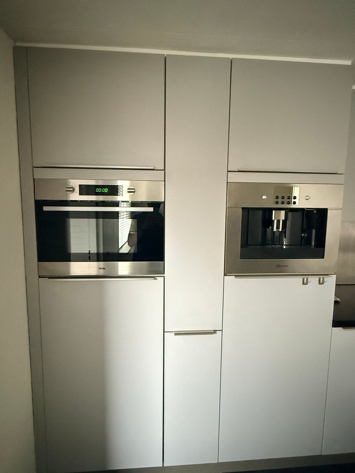 Foto 5 van Moderne U-keuken met inbouwapparatuur