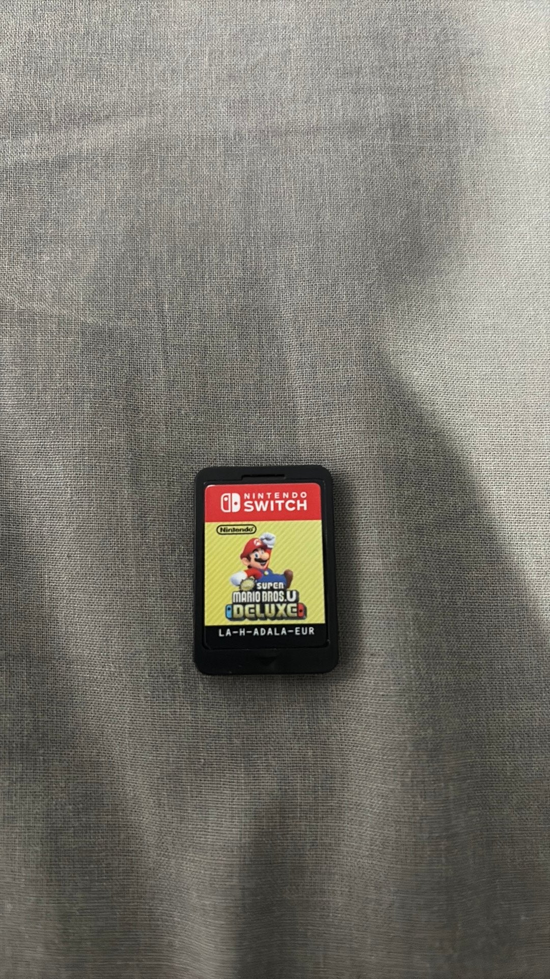 Super Mario Bros. U Deluxe (Nintendo Switch nederlandstalig), Spelcomputers en Games, Games | Nintendo Switch, Gebruikt, Verzenden