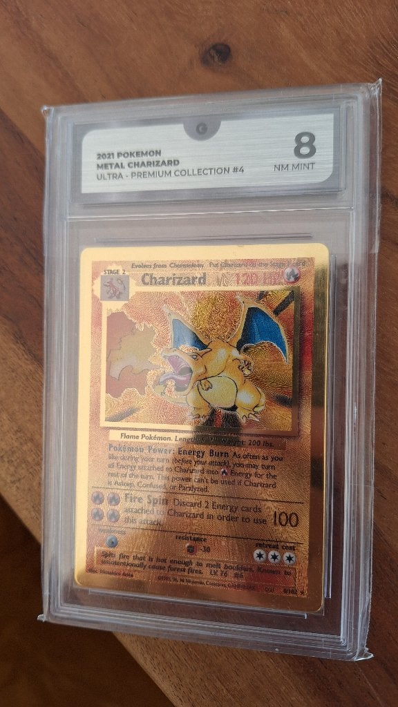 Charizard metal grade 8, Verzenden, Zo goed als nieuw, Losse kaart, Foil